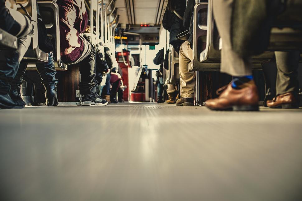 Free Image of Group of People Standing on Train 