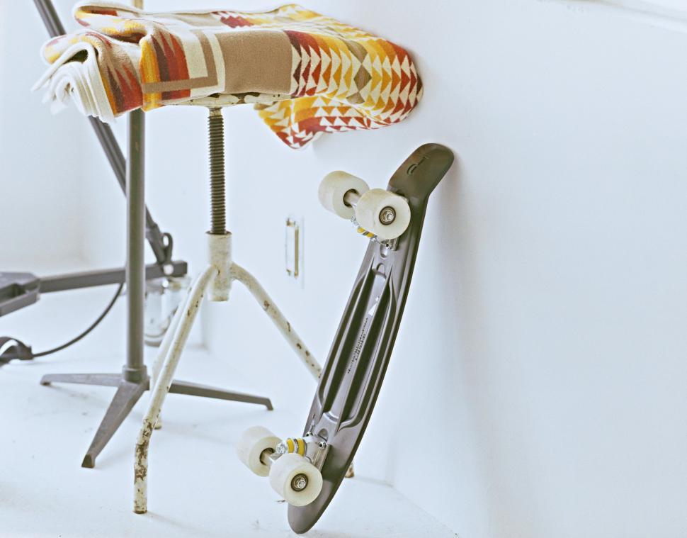 Free Image of Skateboard Leaning Against Wall 