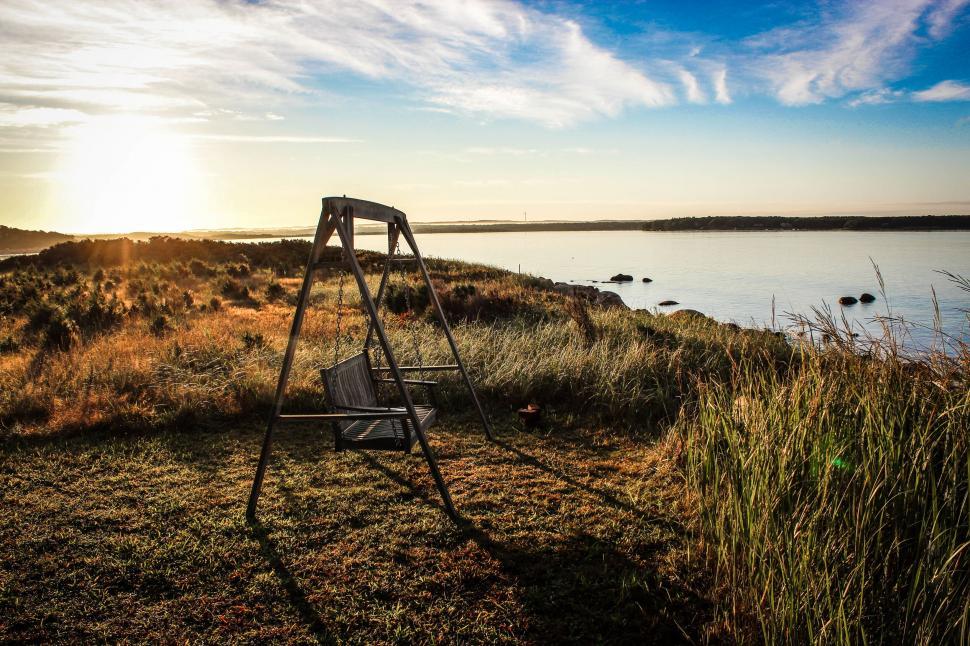 Free Image of Swing Set on Grass Field 