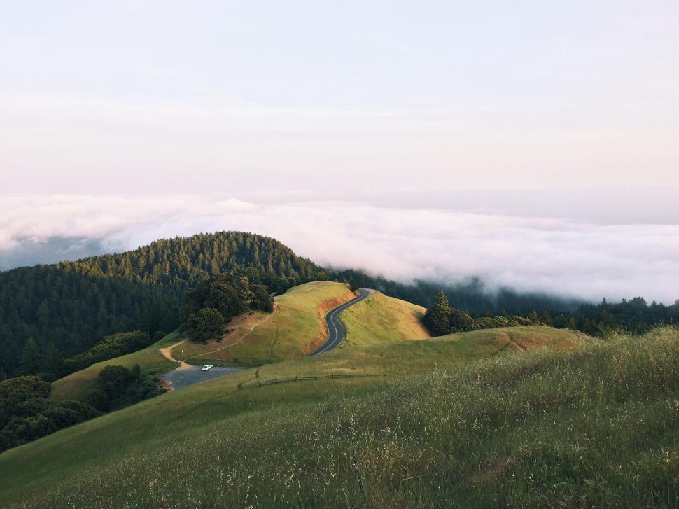 Free Image of Road Cutting Through Grassy Hill 