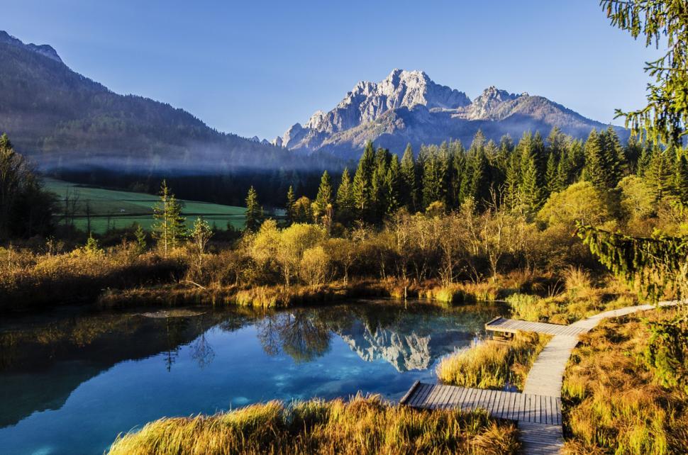 Free Image of Wooden Walkway Leading to Pond in Mountains 