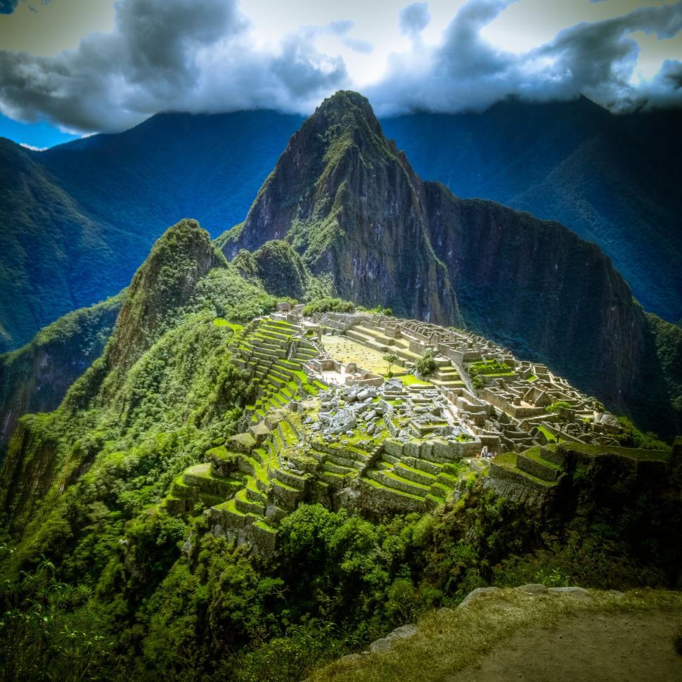 Free Image of Mountain Overlooking Grassy Area 