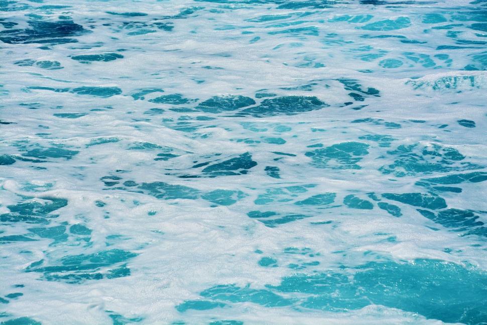 Free Image of Man Riding Surfboard on Top of Ocean Wave 