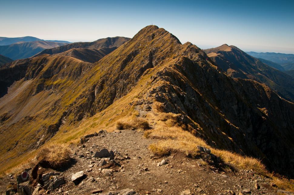 Free Image of A View of a Mountain Range From the Top of a Hill 