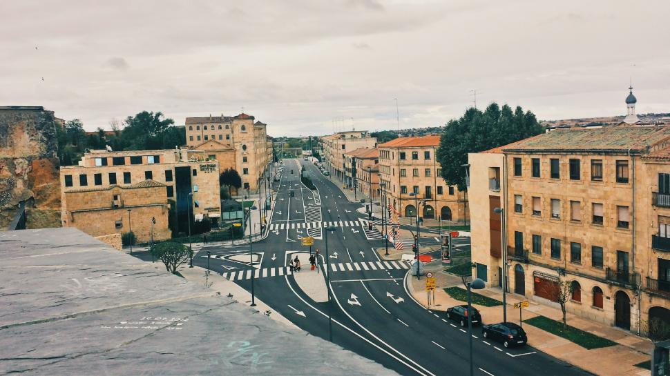 Free Image of Overlooking City Street From Rooftop 
