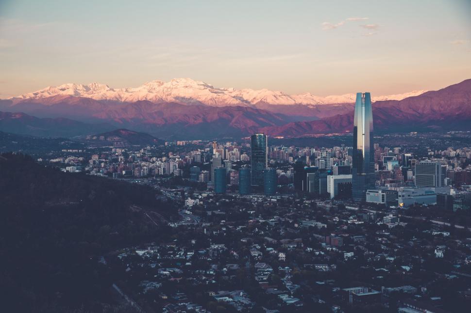 Free Image of City Skyline With Majestic Mountains 