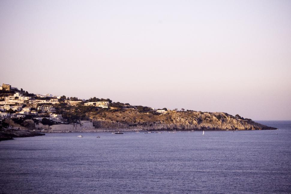 Free Image of Hill Overlooking Body of Water 