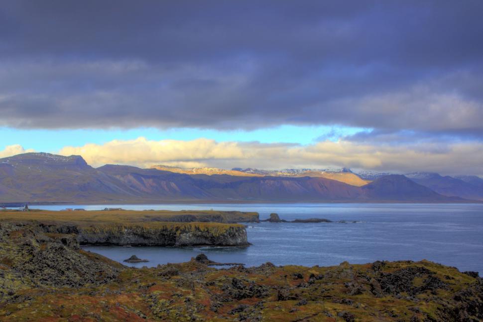 Free Image of Majestic Lake Surrounded by Towering Mountains 