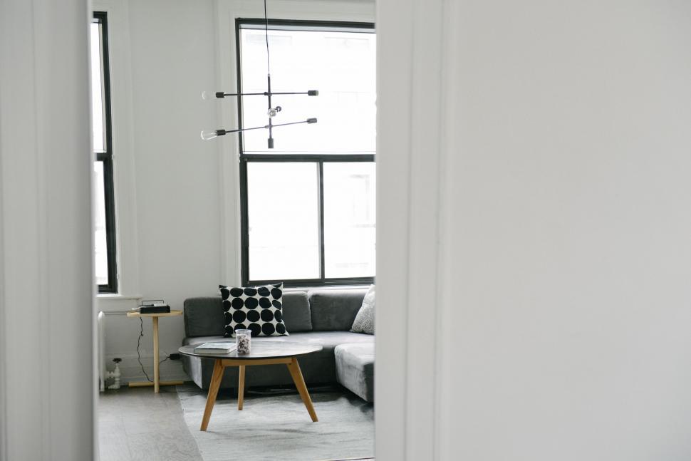 Free Image of Living Room With Couch, Table, and Window 