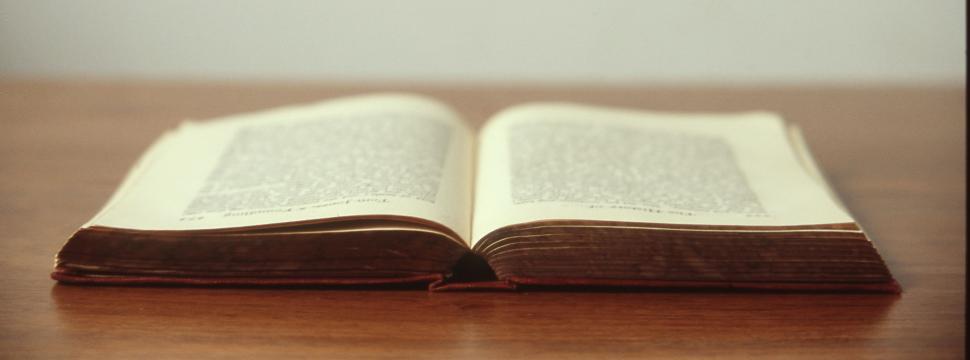 Free Image of Open Book on Wooden Table 