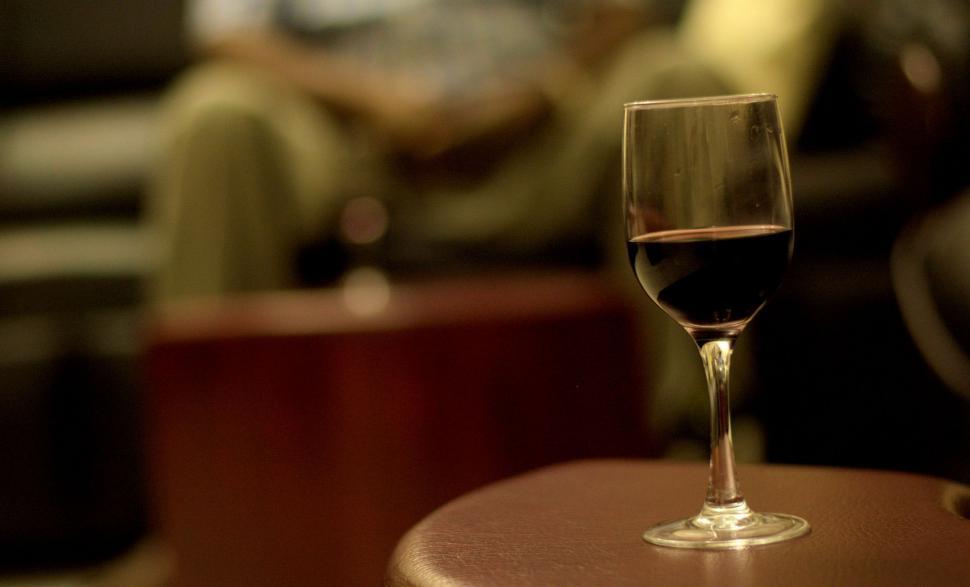 Free Image of A Glass of Wine on a Table 
