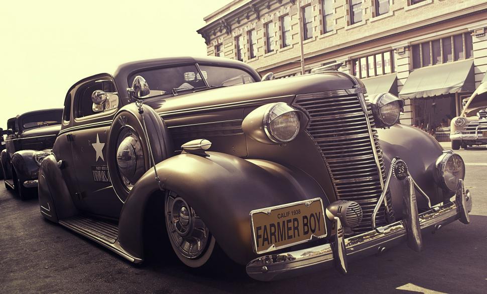 Free Image of Vintage Car Parked on Side of Road 