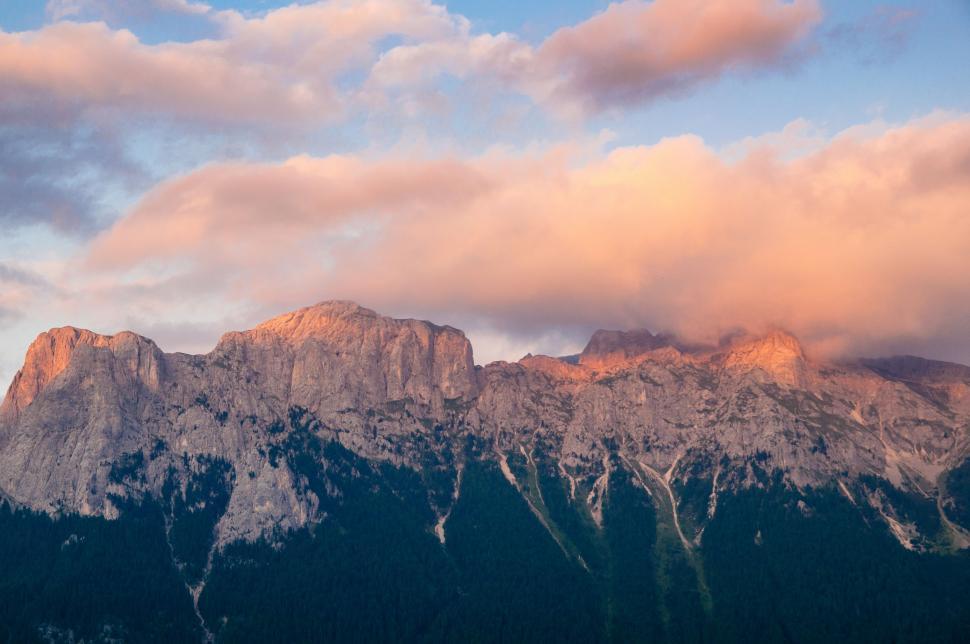 Free Image of Majestic Mountain Range Under Cloudy Sky 