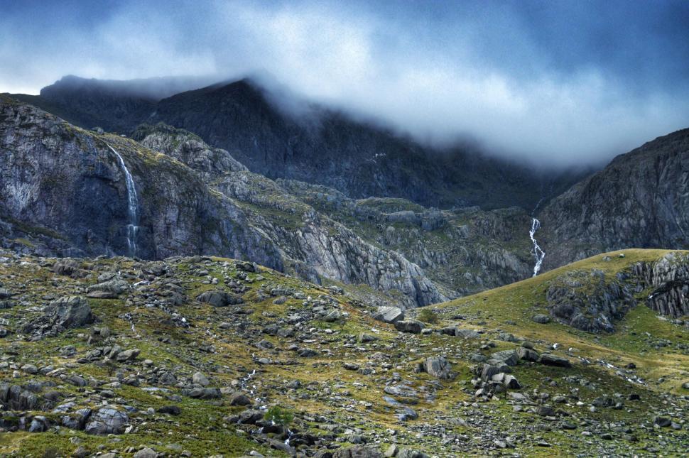 Free Image of Majestic Mountain Range With Distant Waterfall 