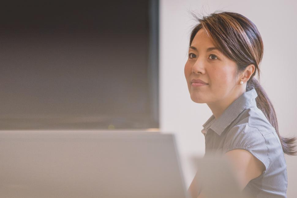 Free Image of Woman Working on Laptop Computer 