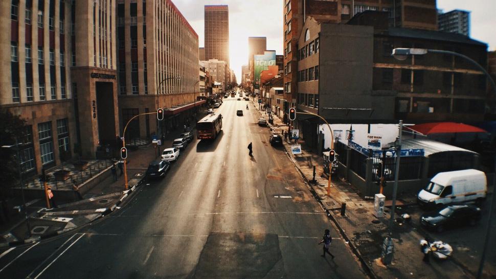 Free Image of Bustling City Street With Tall Buildings 