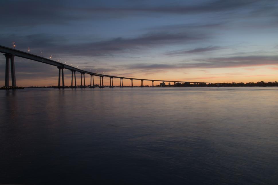 Free Image of Long Bridge Stretching Across Vast Waterway 