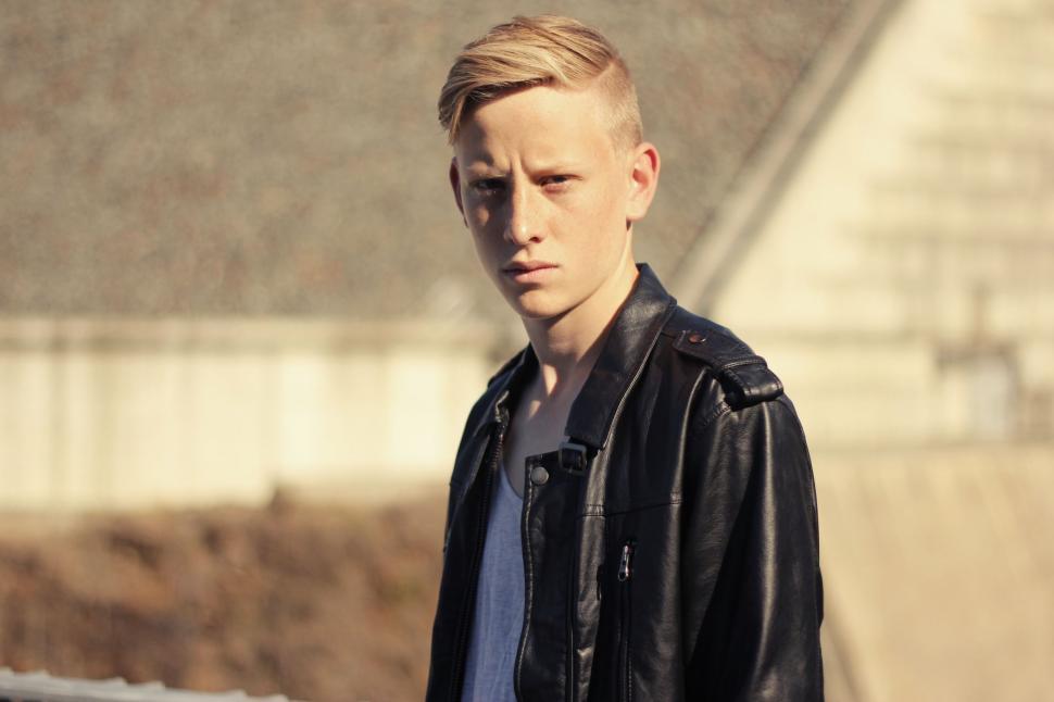 Free Image of Man in Black Leather Jacket and White T-Shirt 
