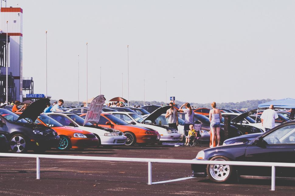 Free Image of Busy Parking Lot Filled With Parked Cars 