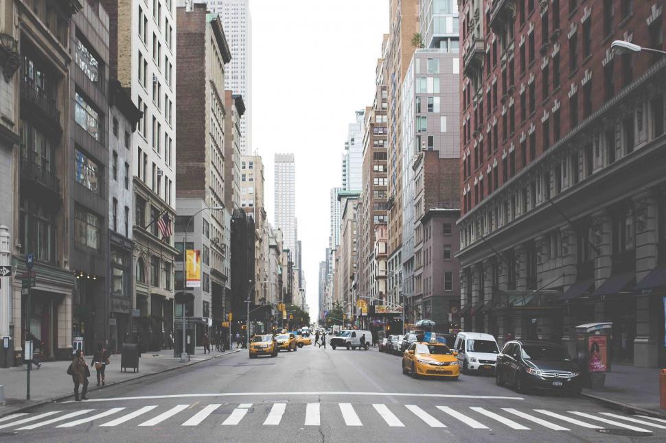 Free Image of Bustling City Street With Tall Buildings 