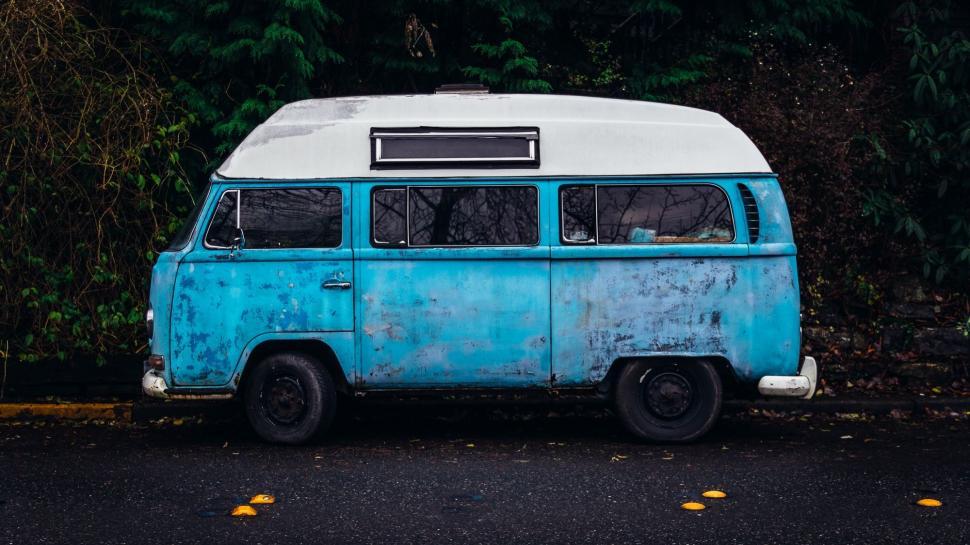 Free Image of Blue and White Van Parked on Side of Road 