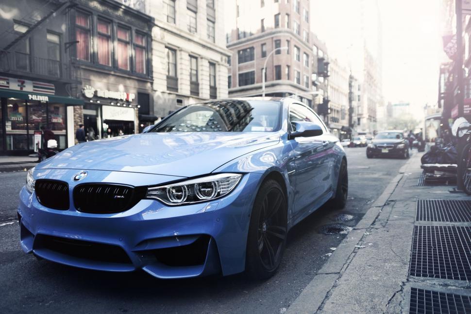 Free Image of Blue Car Parked on Side of Street 