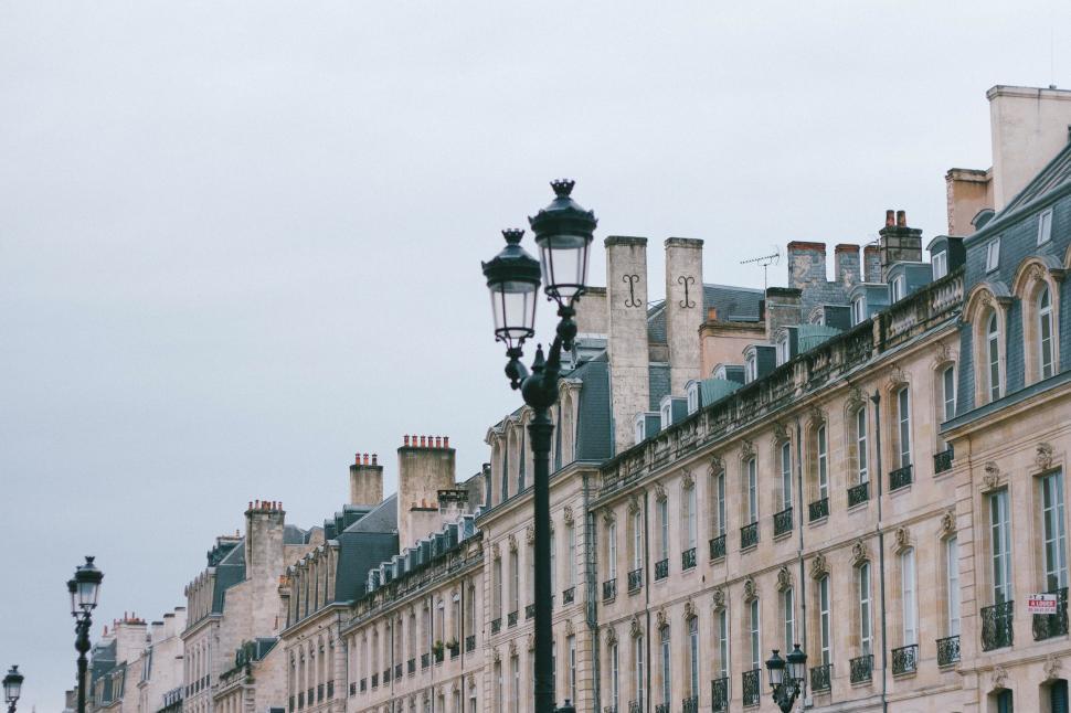 Free Image of Row of Buildings With Street Light 