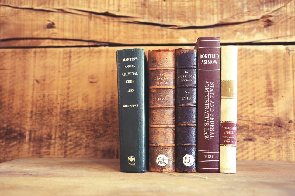 Free Image of Row of Books on Wooden Shelf 