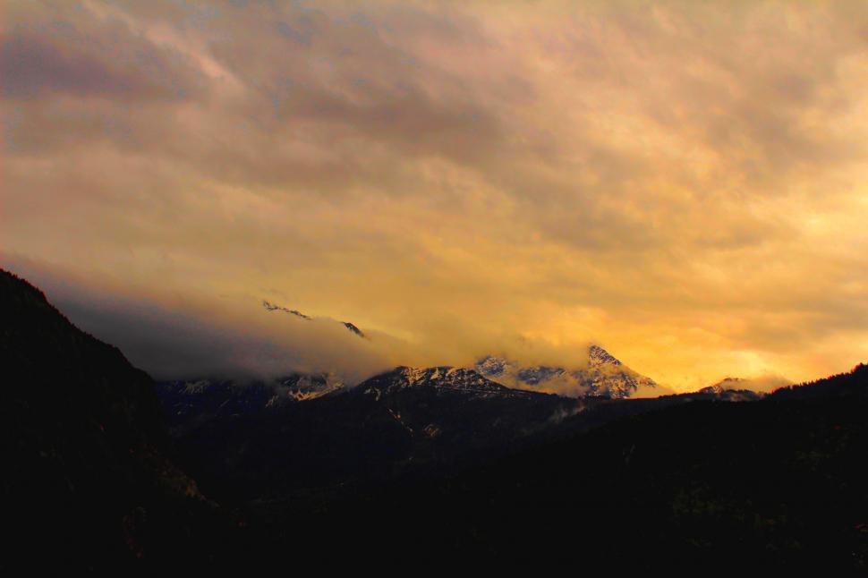 Free Image of Bird Flying Over Mountain Range 