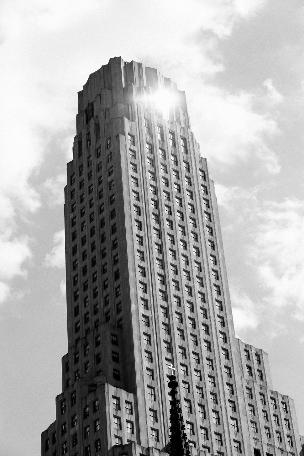 Free Image of Tall Building With Clock on Side 