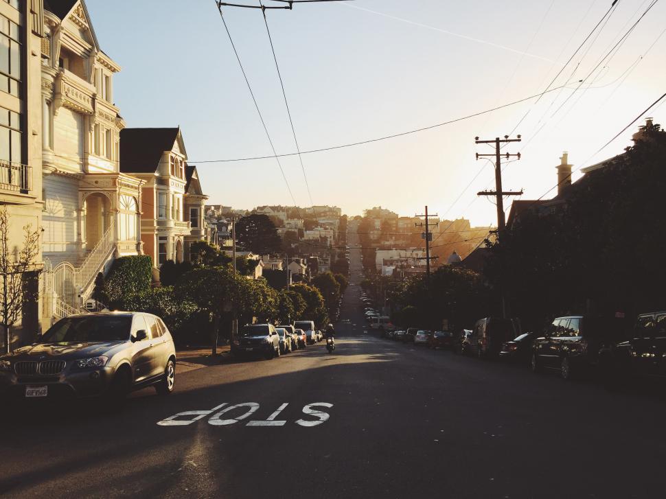 Free Image of Cars Parked Alongside Urban Street 