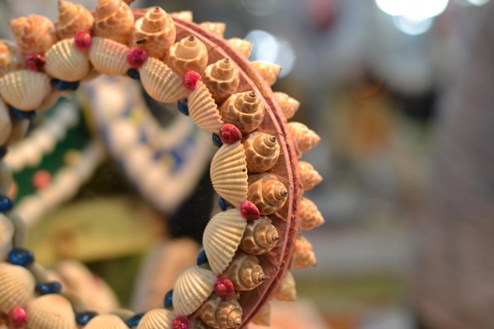 Free Image of Small decorations with beach theme made from seashells and snail shells  