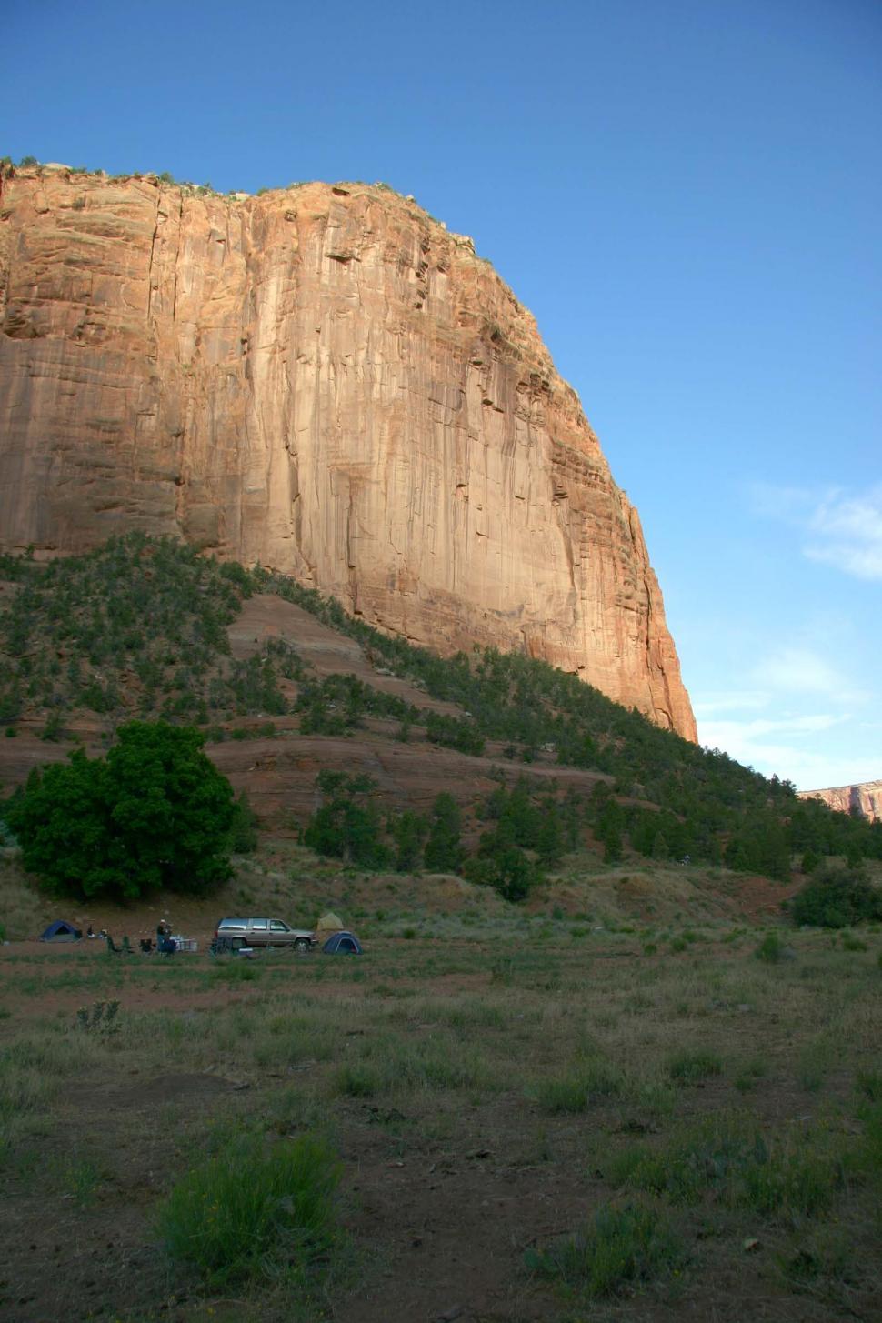 Free Image of Mountain View With Animals in Foreground 