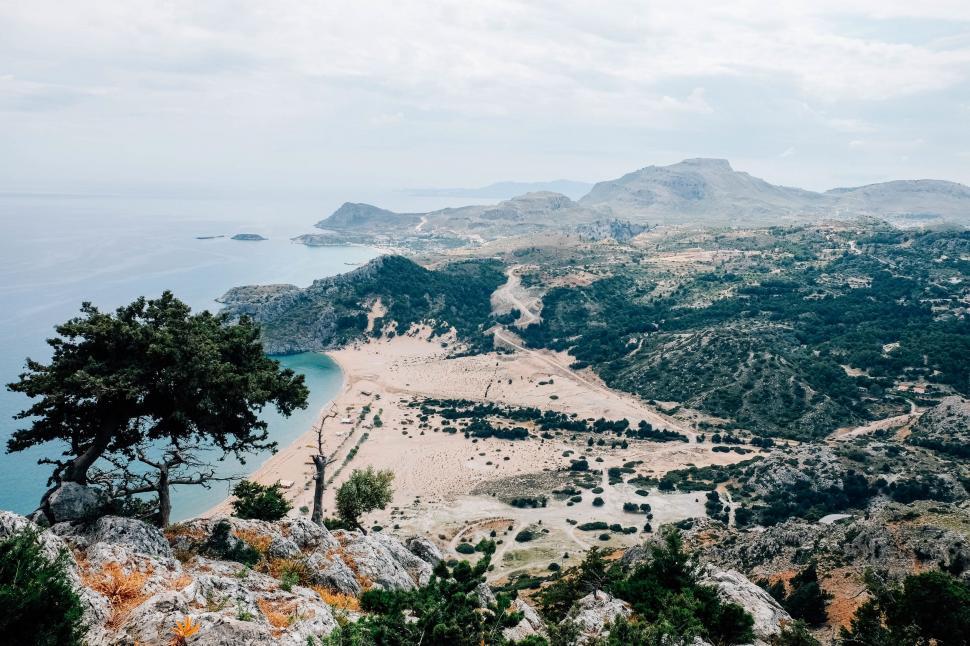 Free Image of A View of a Beach From a Hill 