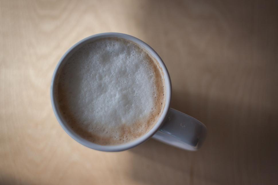 Free Image of A Cup of Coffee on a Table 