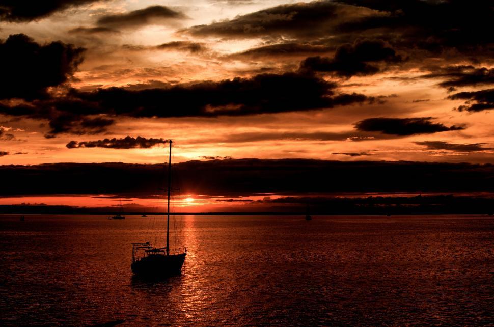 Free Image of Boat Floating on Large Body of Water 