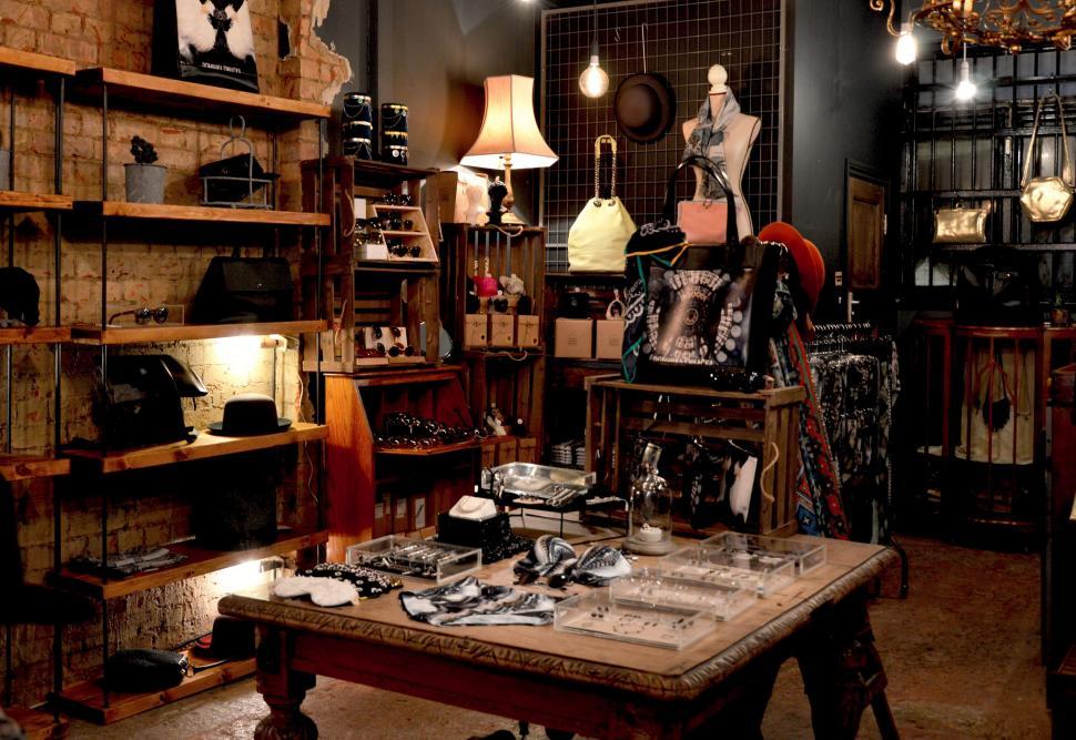Free Image of Room Filled With Shelves and Lamps 
