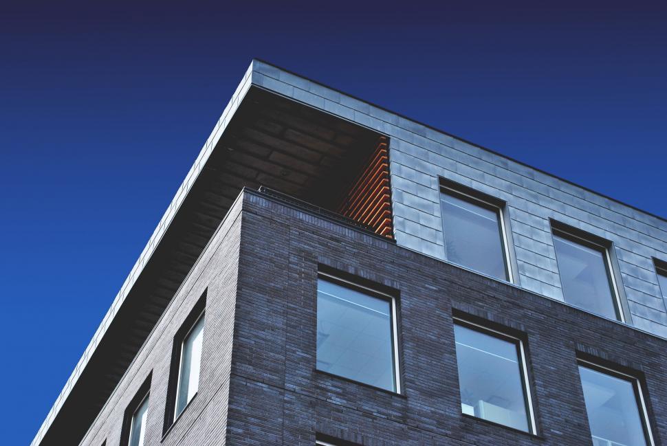 Free Image of Tall Building With Numerous Windows 