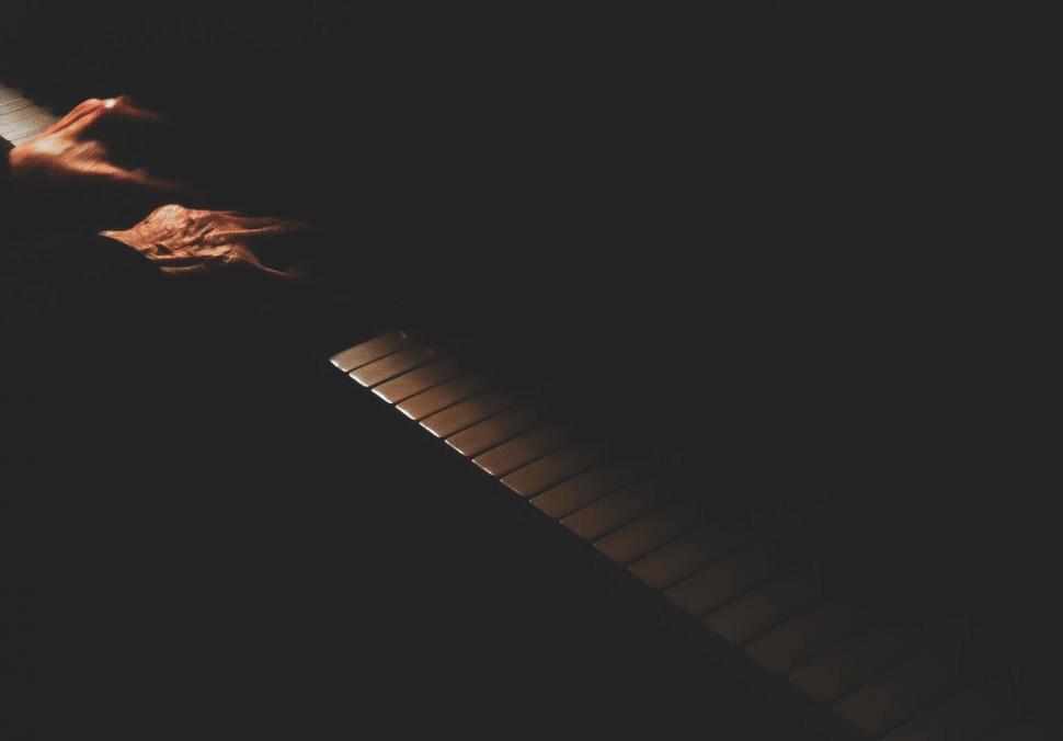 Free Image of Hand on Piano Keys 