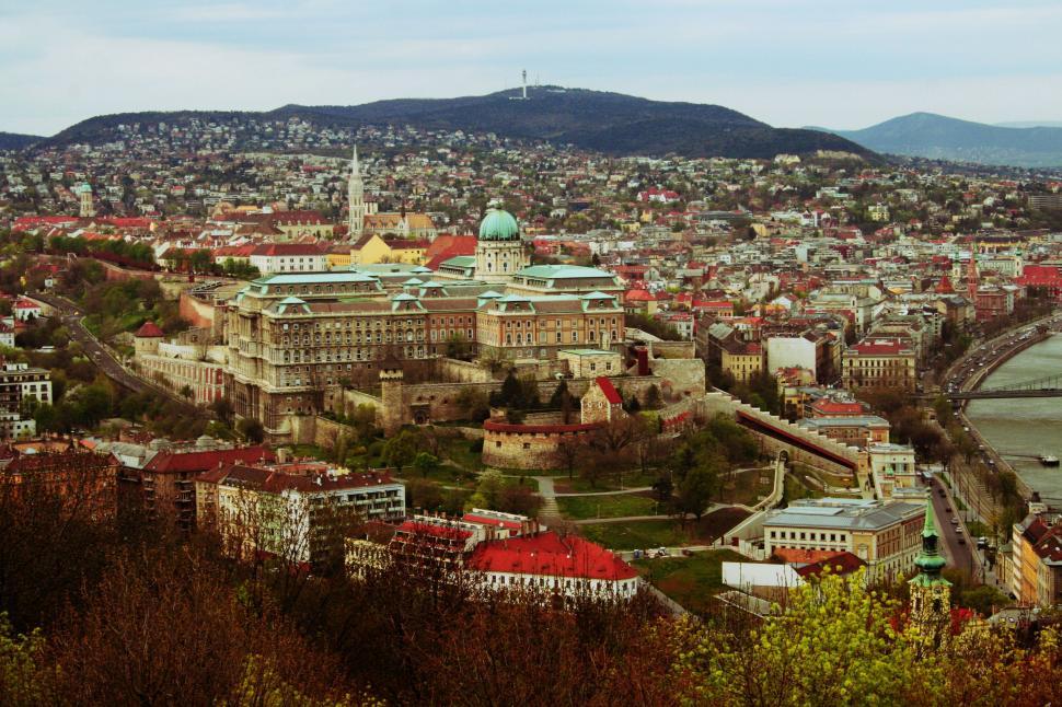 Free Image of Cityscape With Bridge and Mountains 