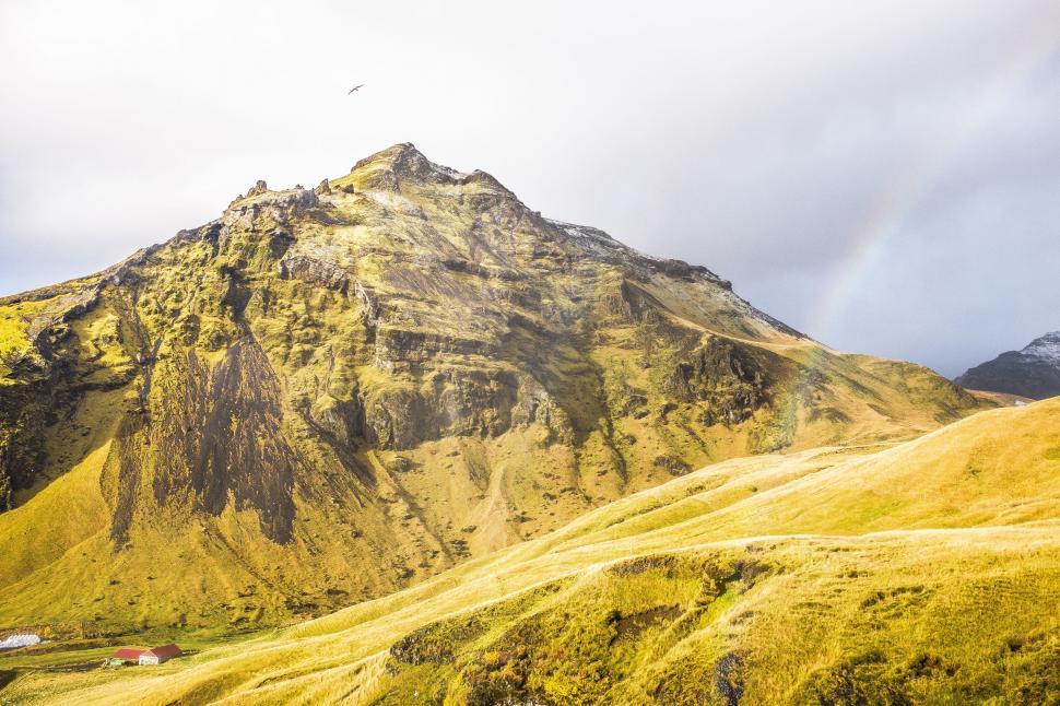Free Image of Majestic Mountain With Rainbow in the Sky 
