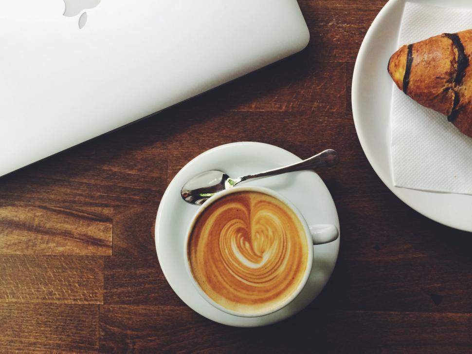 Free Image of A Cup of Coffee and Pastry on Plate 
