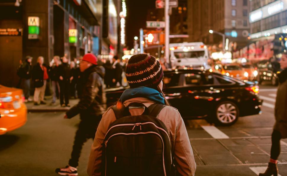 Free Image of Group of People Standing On the Side of a Street 