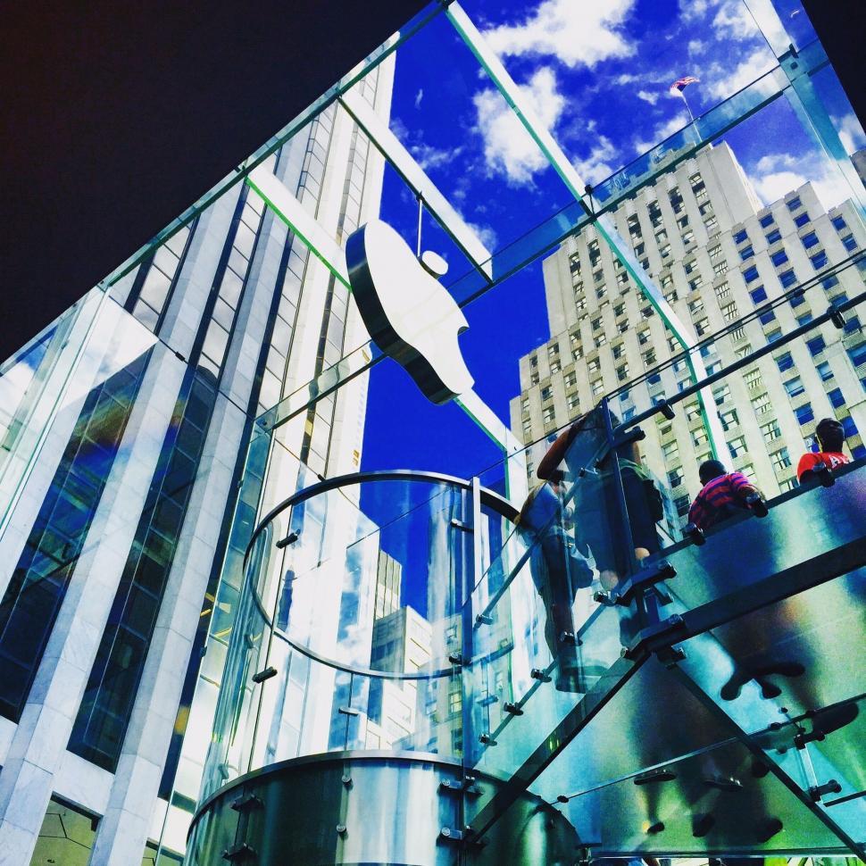 Free Image of Glass Building Reflecting People 