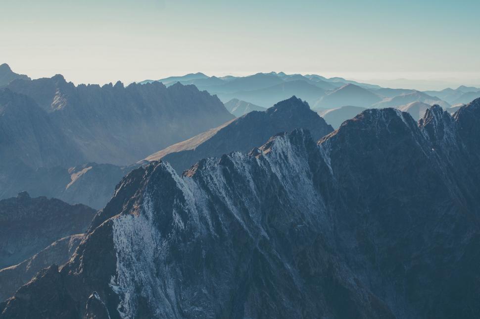 Free Image of A View of a Mountain Range From an Airplane 