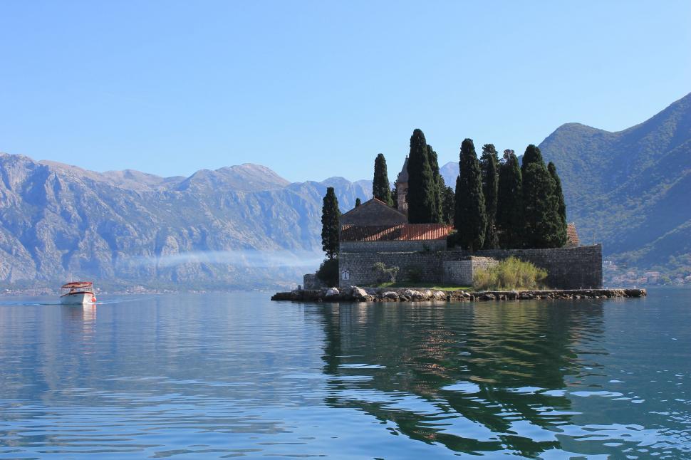 Free Image of Small Island in the Middle of a Lake 