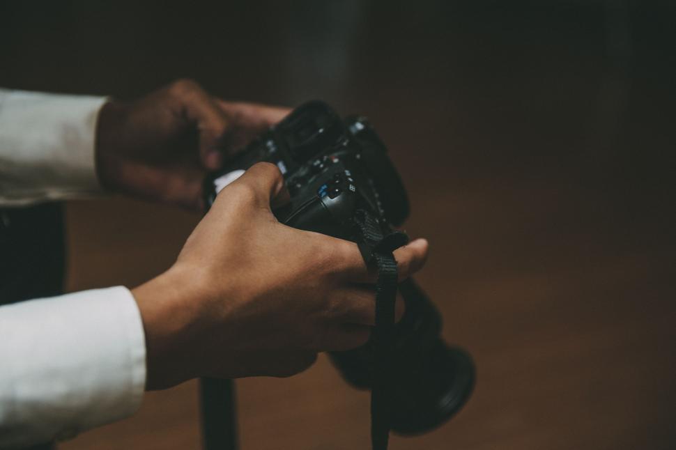 Free Image of Person Holding a Piece of Chocolate 