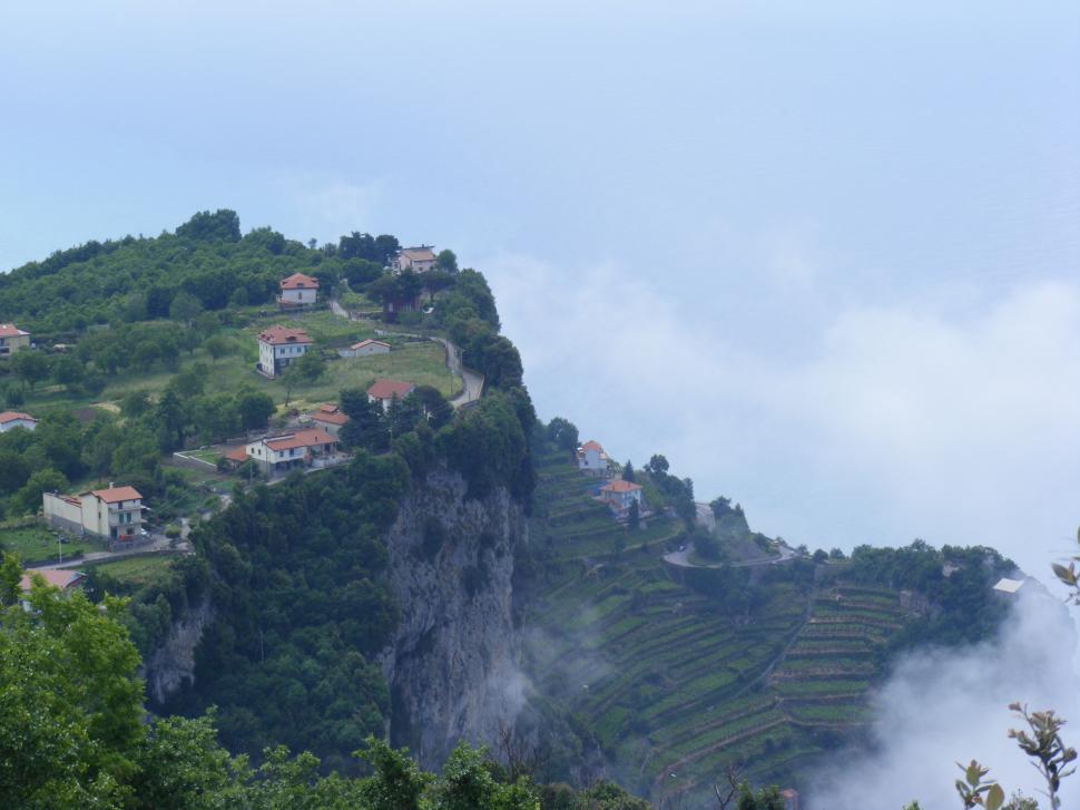 Free Image of Small rural mountain town under the clouds  