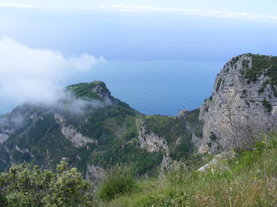 Free Image of Mountain peaks under the clouds  