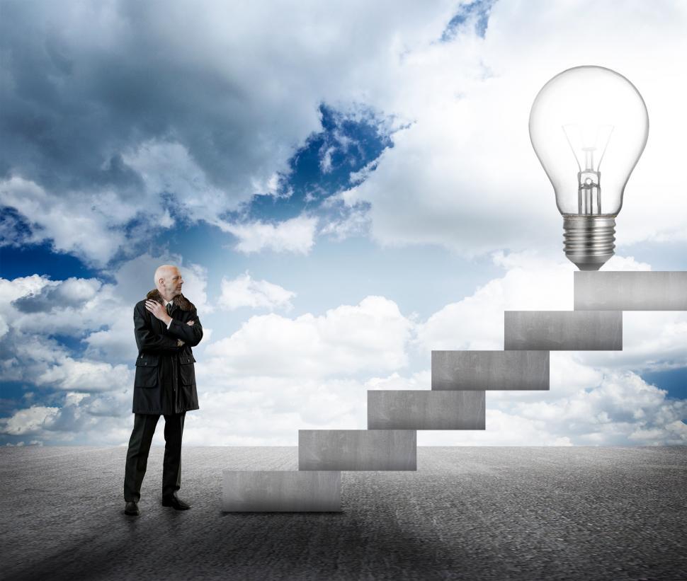 businessman-facing-stairs-with-lightbulb.jpg